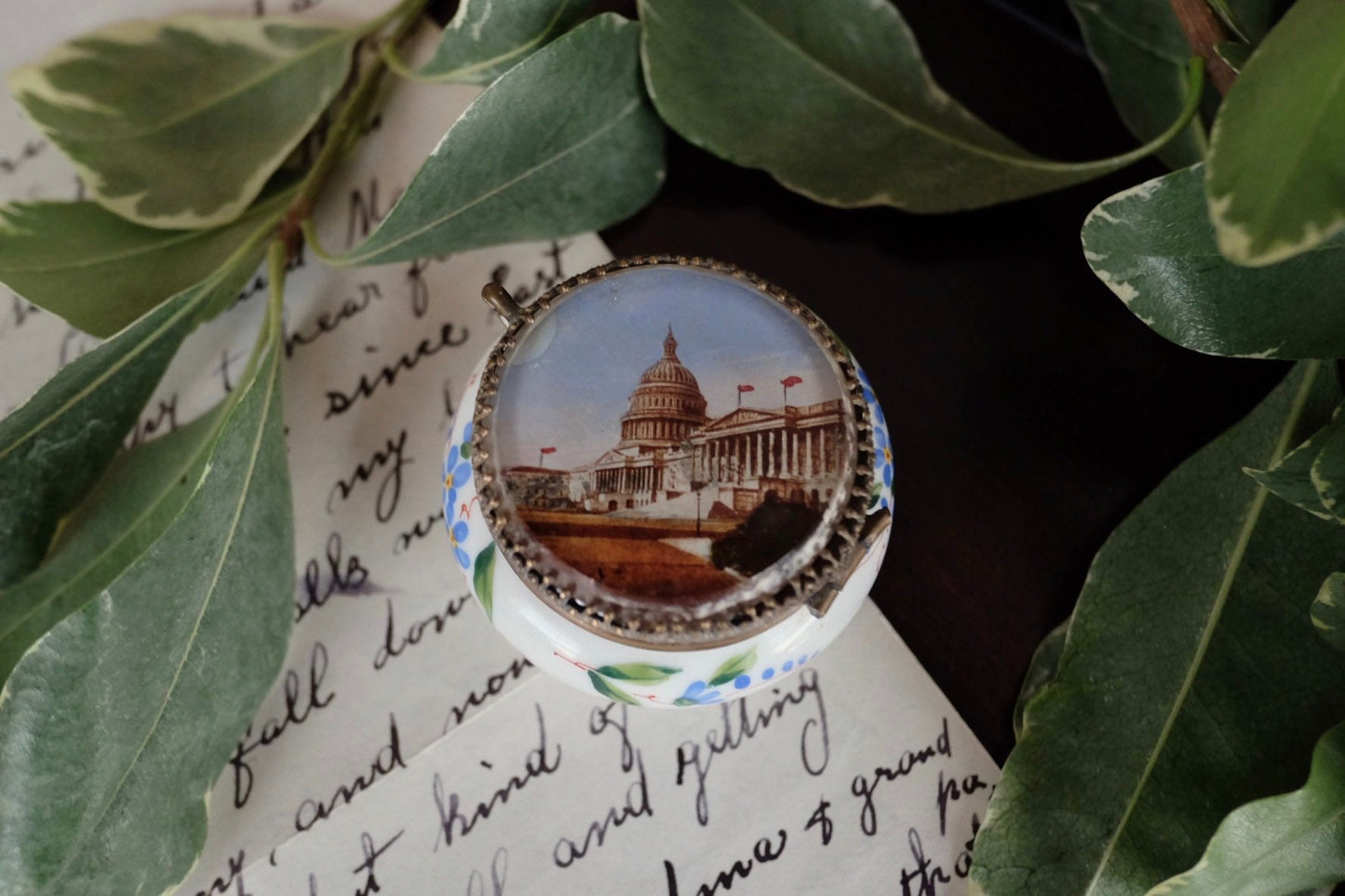 An Early 1900s Reverse Painted Souvenir Patch Box Snuff Box of the United States Capitol